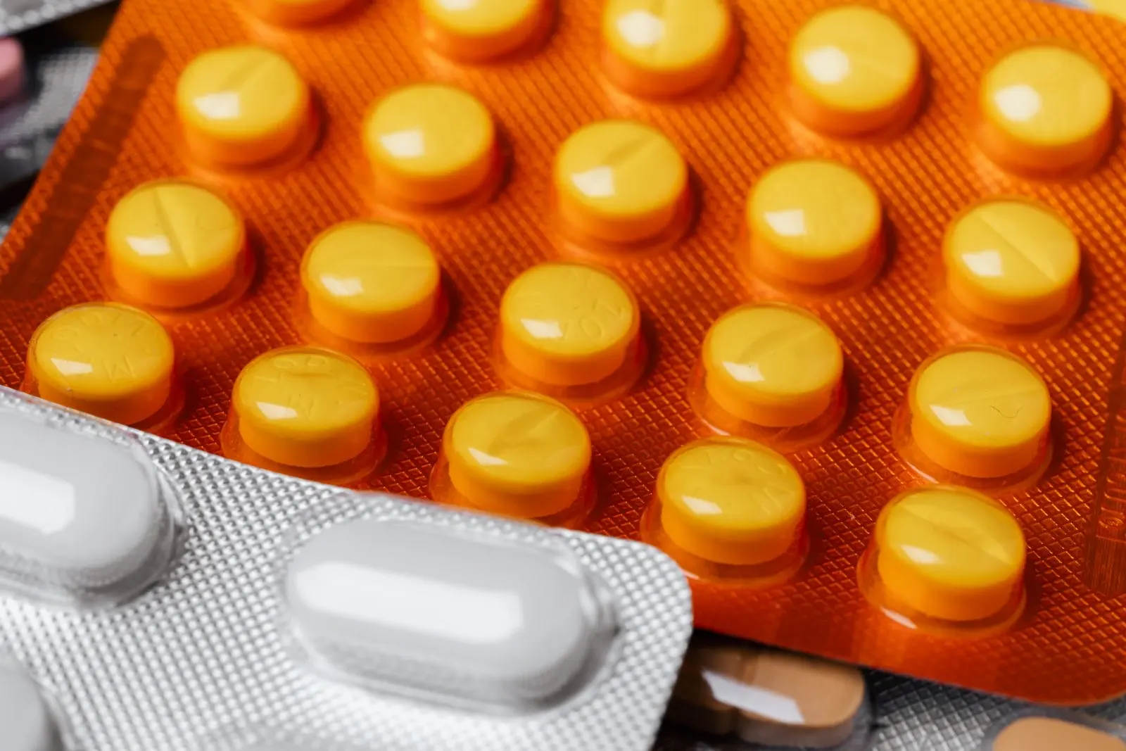 Close-up of blister packs of tablets, the painkillers people reach for during a migraine attack